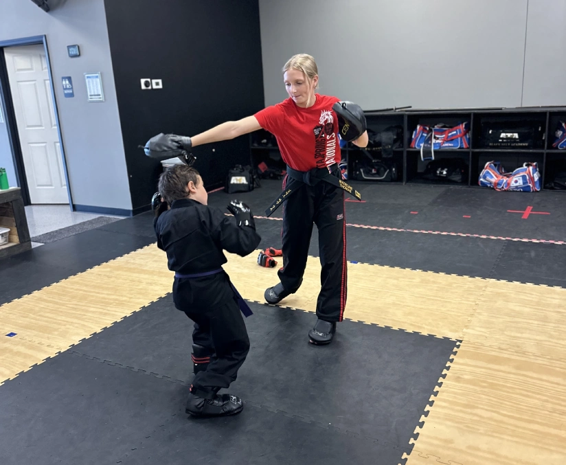 Children practicing martial arts in Angola, developing lifelong discipline, focus, and self-respect.